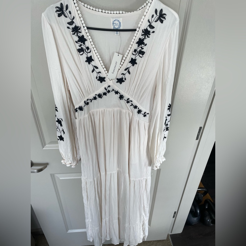 Francesca’s dress never worn size M